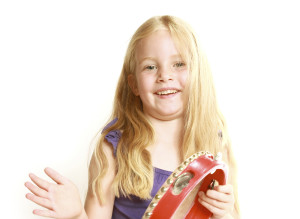 Little girl with tambourine